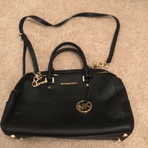 Black Michael Kors purse with dust bag